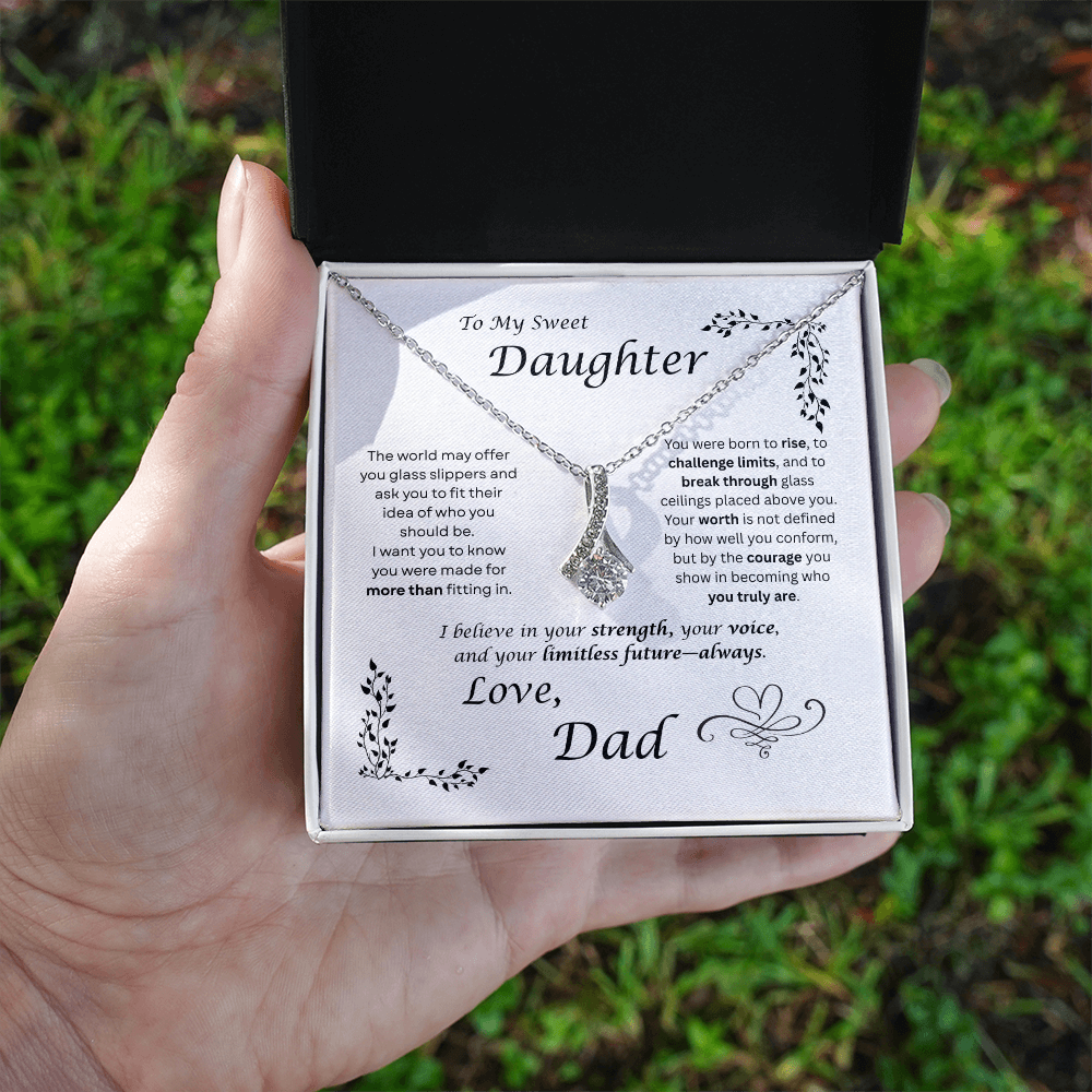 The world may ask her to fit in… I want my daughter to rise and break ceilings. Alluring Beauty necklace. White card design